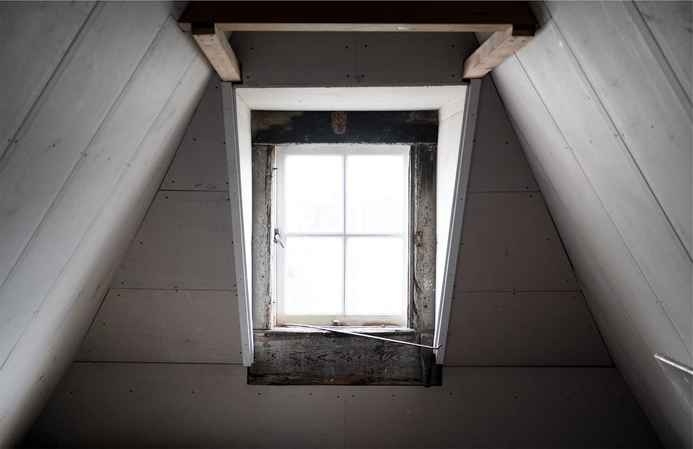 loft window with sloping ceiling